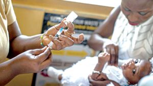A baby receives a dose of the RTS,S vaccine for malaria in Cape Coast, Ghana in 2019. Credit: Cristina Aldehuela/AFP/Getty/Nature